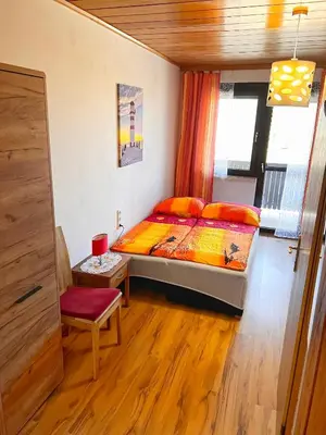 Ein Bett oder Betten in einem Zimmer der Unterkunft Frühstückspension See-Panorama