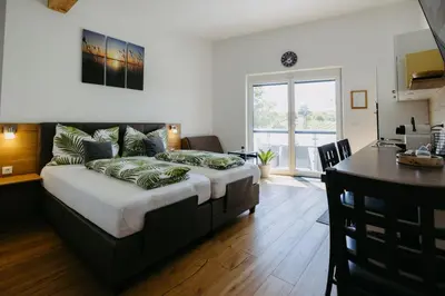 Ein Bett oder Betten in einem Zimmer der Unterkunft Sonnenweg Appartements