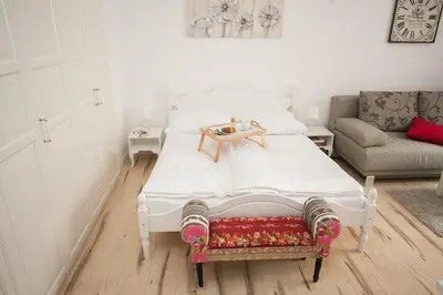 Ein Bett oder Betten in einem Zimmer der Unterkunft Traditional Apartments Vienna TAV - City