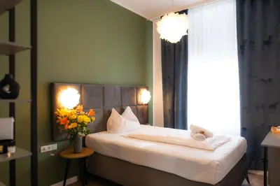 Ein Bett oder Betten in einem Zimmer der Unterkunft Florum Hotel