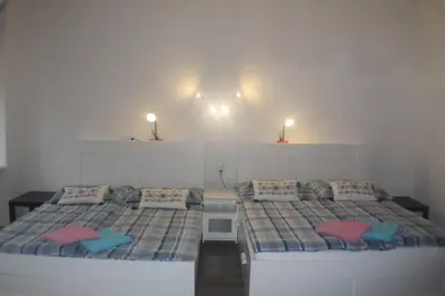 Ein Bett oder Betten in einem Zimmer der Unterkunft FEWO Pazmaniten