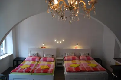 Ein Bett oder Betten in einem Zimmer der Unterkunft FEWO Pazmaniten
