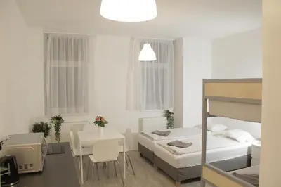 Ein Bett oder Betten in einem Zimmer der Unterkunft Hauptbahnhof S3