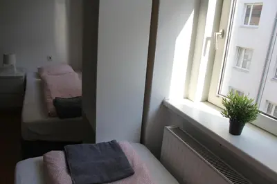 Ein Bett oder Betten in einem Zimmer der Unterkunft Hauptbahnhof S3