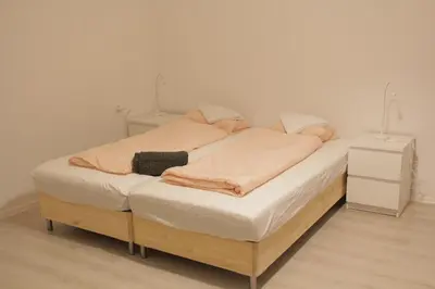 Ein Bett oder Betten in einem Zimmer der Unterkunft Hauptbahnhof S3