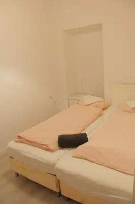 Ein Bett oder Betten in einem Zimmer der Unterkunft Hauptbahnhof S3