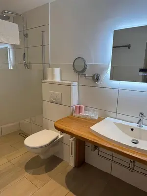 Ein Badezimmer in der Unterkunft Pension Amelie