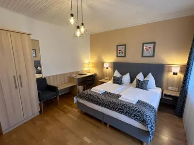 Ein Bett oder Betten in einem Zimmer der Unterkunft Pension Amelie