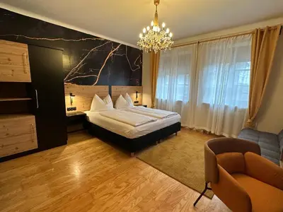 Ein Bett oder Betten in einem Zimmer der Unterkunft Pension Amelie
