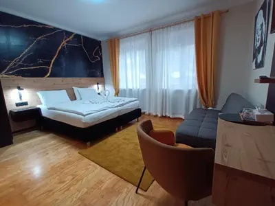 Ein Bett oder Betten in einem Zimmer der Unterkunft Pension Amelie