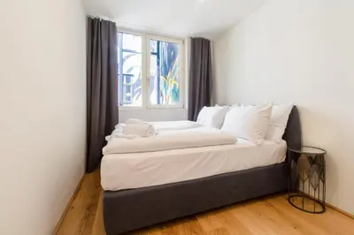 Ein Bett oder Betten in einem Zimmer der Unterkunft Luxury Residence near Parlament in @YourVienna