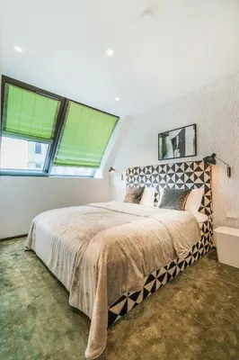 Ein Bett oder Betten in einem Zimmer der Unterkunft Luxury Residence near Parlament in @YourVienna