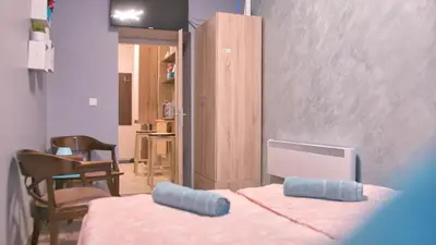 Ein Bett oder Betten in einem Zimmer der Unterkunft Minnie Mouse
