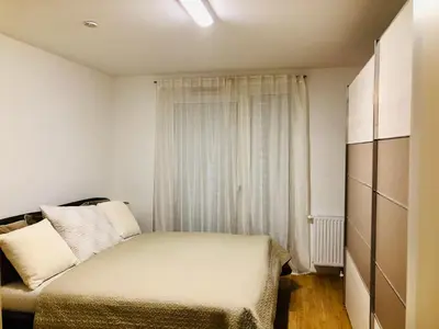 Ein Bett oder Betten in einem Zimmer der Unterkunft Amazing Austria Center Apartment near UNO City