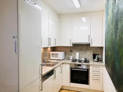 Küche/Küchenzeile in der Unterkunft Amazing Austria Center Apartment near UNO City