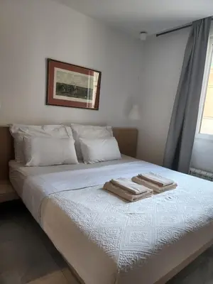 Ein Bett oder Betten in einem Zimmer der Unterkunft Elegant Cozy Apartment