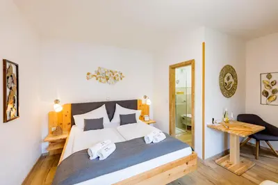 Ein Bett oder Betten in einem Zimmer der Unterkunft Winzerhof Lentsch