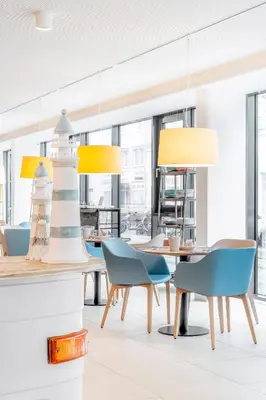 Ein Sitzbereich in der Unterkunft myNext - Hotel Leo