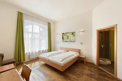Ein Bett oder Betten in einem Zimmer der Unterkunft Hotel Mocca