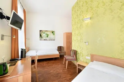 Ein Bett oder Betten in einem Zimmer der Unterkunft Hotel Mocca
