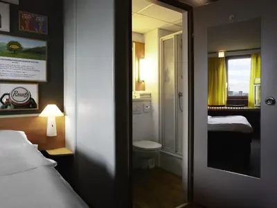 Ein Bett oder Betten in einem Zimmer der Unterkunft Ibis Wien Mariahilf