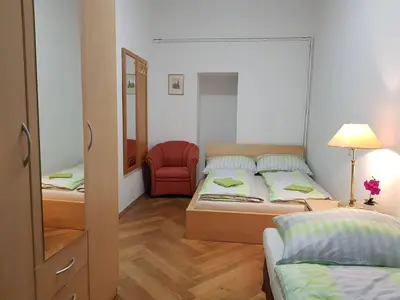 Ein Bett oder Betten in einem Zimmer der Unterkunft Ferienwohnung Schloessel 26/16