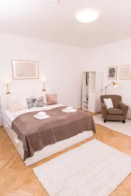 Ein Bett oder Betten in einem Zimmer der Unterkunft Heart of Ottakring
