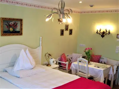 Ein Bett oder Betten in einem Zimmer der Unterkunft Hotel Schneider-Gössl