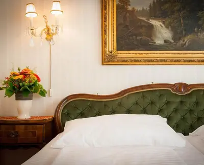 Ein Bett oder Betten in einem Zimmer der Unterkunft Hotel Pension Suzanne