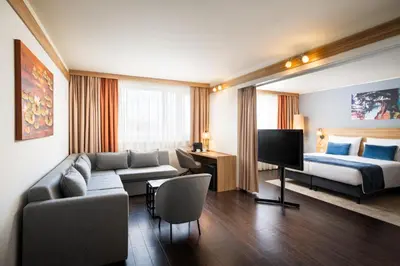 Ein Bett oder Betten in einem Zimmer der Unterkunft Leonardo Hotel Vienna Schönbrunn