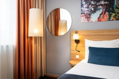 Ein Bett oder Betten in einem Zimmer der Unterkunft Leonardo Hotel Vienna Schönbrunn