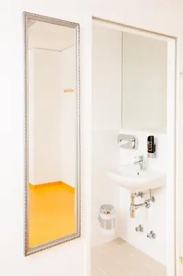 Ein Badezimmer in der Unterkunft A&T Hotel & Hostel