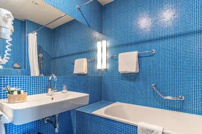 Ein Badezimmer in der Unterkunft Hotel König von Ungarn