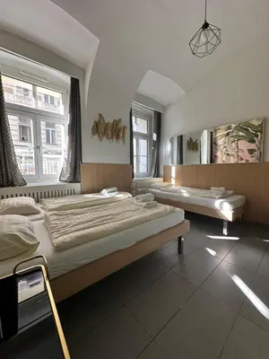 Ein Bett oder Betten in einem Zimmer der Unterkunft stay in six