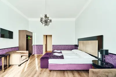 Ein Bett oder Betten in einem Zimmer der Unterkunft Hotel Pension Baron am Schottentor