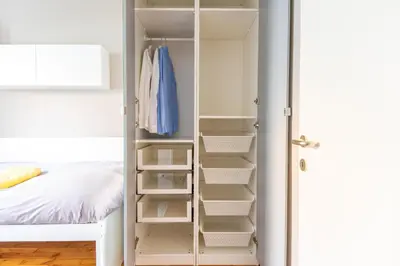 Ein Bett oder Betten in einem Zimmer der Unterkunft Town House near Metro & Vienna City Center