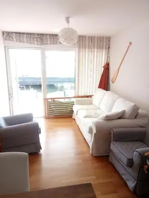 Ein Sitzbereich in der Unterkunft Bootshaus am See
