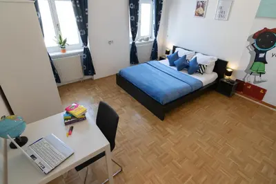 Ein Bett oder Betten in einem Zimmer der Unterkunft Yeshello Apartment near Central Station