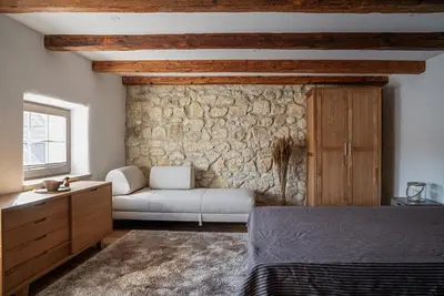 Ein Bett oder Betten in einem Zimmer der Unterkunft Presshaus Schützen