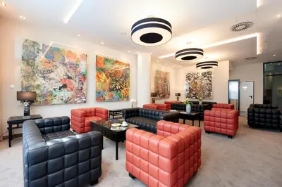 Ein Sitzbereich in der Unterkunft Singerstrasse 21-25 Aparthotel 350m next to St Stephen's Square