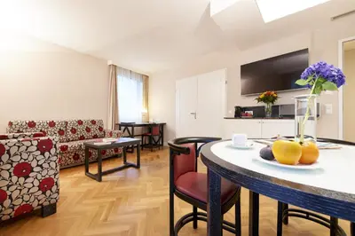 Ein Sitzbereich in der Unterkunft Singerstrasse 21-25 Aparthotel 350m next to St Stephen's Square