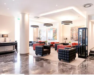 Ein Sitzbereich in der Unterkunft Singerstrasse 21-25 Aparthotel 350m next to St Stephen's Square