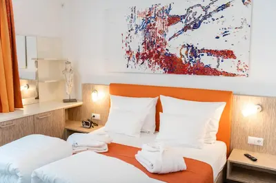 Ein Bett oder Betten in einem Zimmer der Unterkunft Skyflats Vienna - Belle View