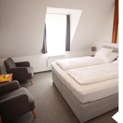 Ein Bett oder Betten in einem Zimmer der Unterkunft Haus56