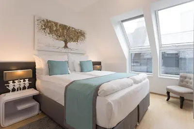 Ein Bett oder Betten in einem Zimmer der Unterkunft Mar Suite Apartments - Center