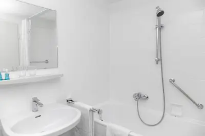 Ein Badezimmer in der Unterkunft Pension Sacher - Apartments am Stephansplatz
