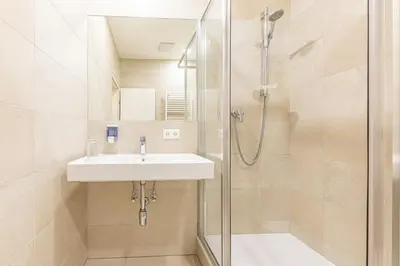 Ein Badezimmer in der Unterkunft Hotel-Pension Fünfhaus