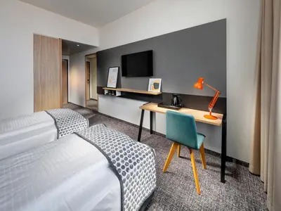 Ein Bett oder Betten in einem Zimmer der Unterkunft Clarion Hotel Vienna South