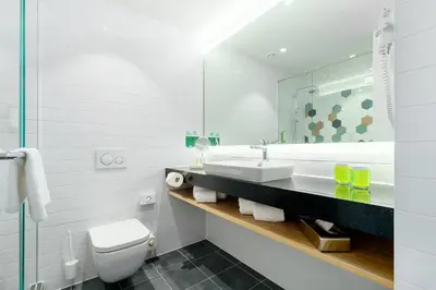 Ein Badezimmer in der Unterkunft Clarion Hotel Vienna South