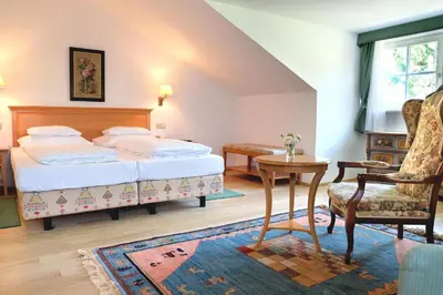 Ein Bett oder Betten in einem Zimmer der Unterkunft Hotel Landhaus Fuhrgassl-Huber